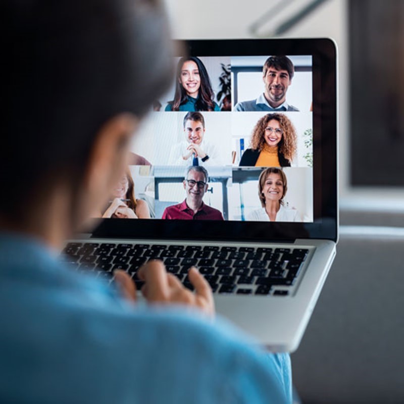 photo of a woman in a virtual meeting.