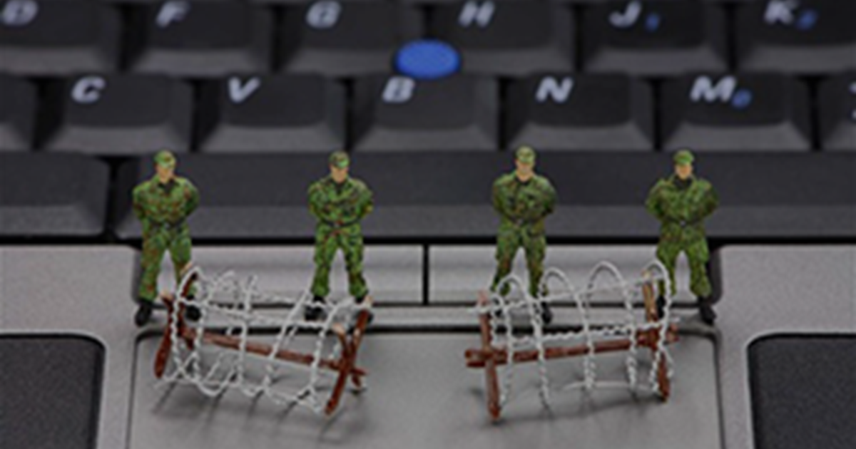 mini soldiers protecting a keyboard